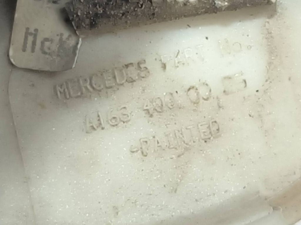 Mercedes-Benz ML W163 2000 Original wheel cap A1634000025 