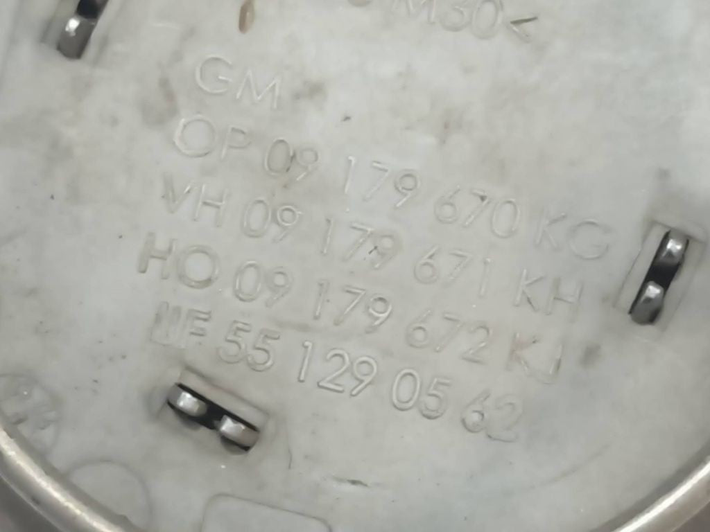 Opel Astra G 2000 Original wheel cap 09179670 