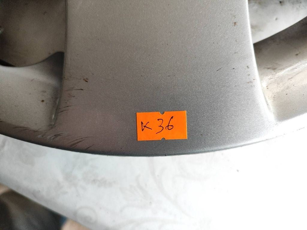 Nissan Almera N16 2003 R16 wheel hub cap 40315AV610 