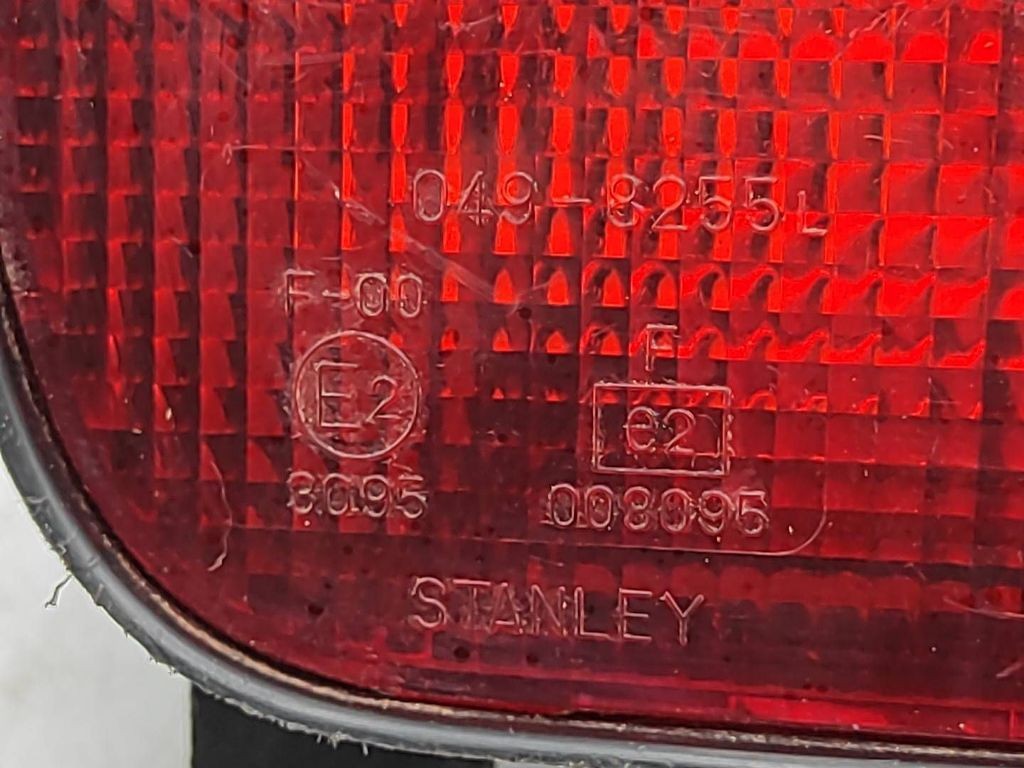 Mazda 323 1998 rear left side fog light 0498255L 